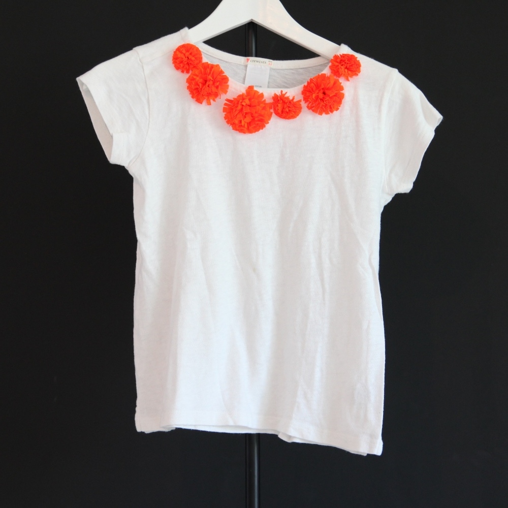 white shirt with orange flowers